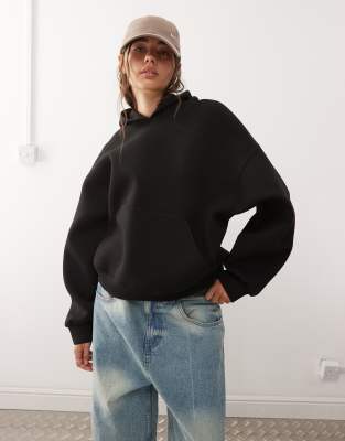 Weekday - Oversize-Kapuzenpullover aus neoprenähnlichem Material in Schwarz