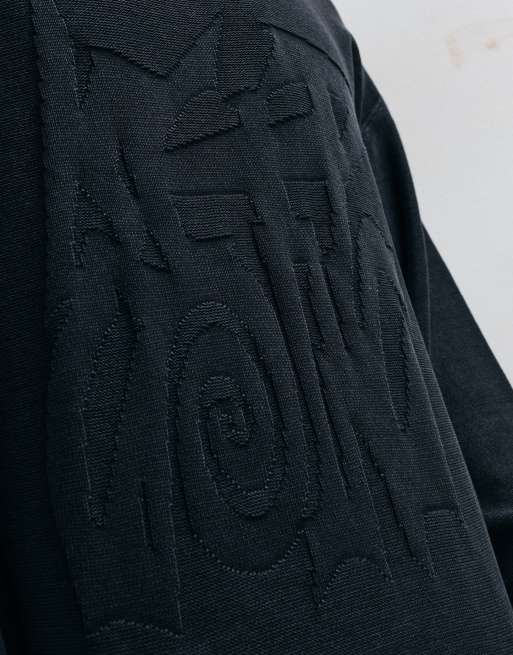 Weekday Oversize-Pullover mit Keep Going 3D-Jacquard-Grafik in Schwarz, 2 von 5
