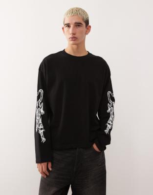 Weekday Oversized Boxy Fit Long Sleeve T-shirt With Panther Sleeve Graphic In Black