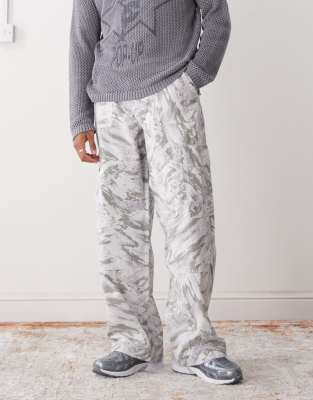 Weekday Weekday oversized cargo trousers with graphic print in off-white