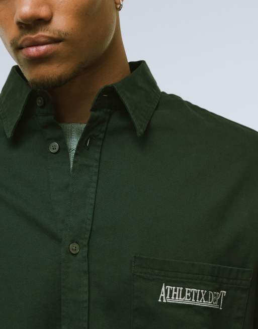 Weekday oversized fit long sleeve shirt with text embroidery in dark green