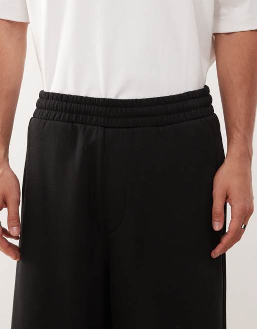 Weekday - Oversized joggingbroek van zware stof met wijde pijpen in zwart, 4 van 5
