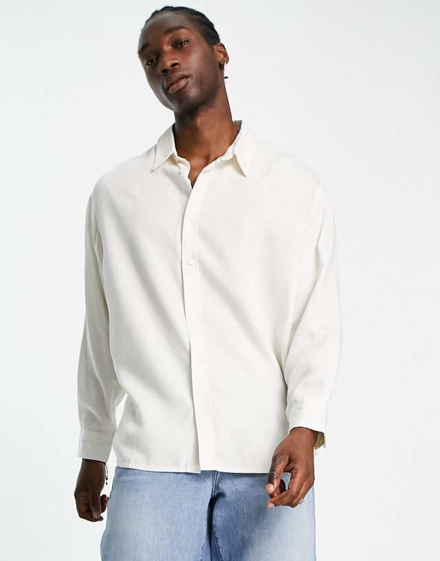 Weekday oversized long sleeve shirt in white