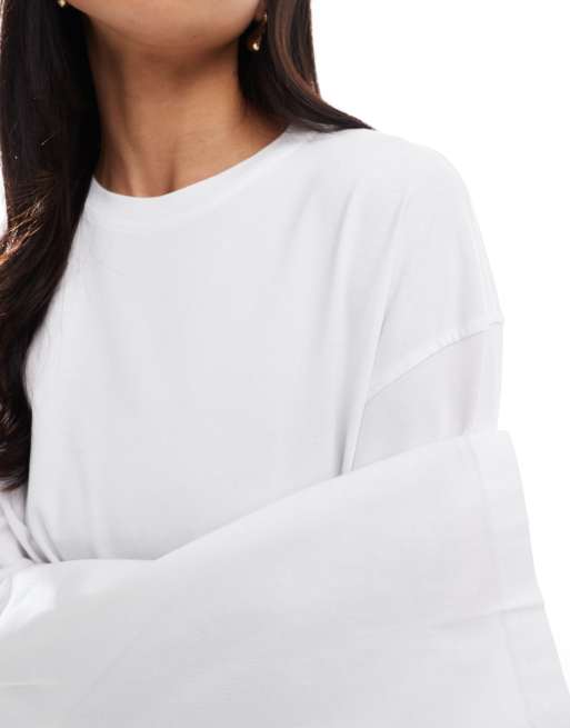 Weekday oversized long sleeve top in white