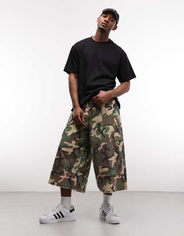 Weekday oversized longline shorts in green camo | ASOS