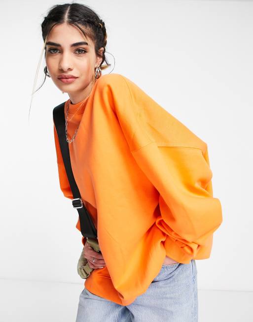 ASOS DESIGN oversized sweatshirt in neon orange