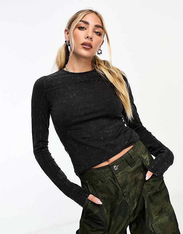 Weekday - pace long sleeve top with exposed seams in acid wash black
