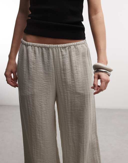Weekday - Pantaloni stropicciati a fondo ampio beige chiaro, 3 di 5