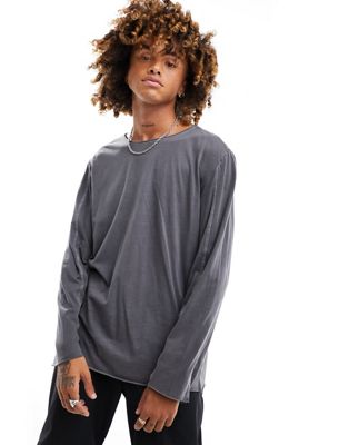 Weekday Parker slouch long sleeve t-shirt with raw hem detail in washed black