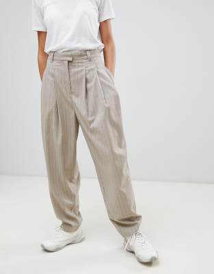 beige tapered trousers