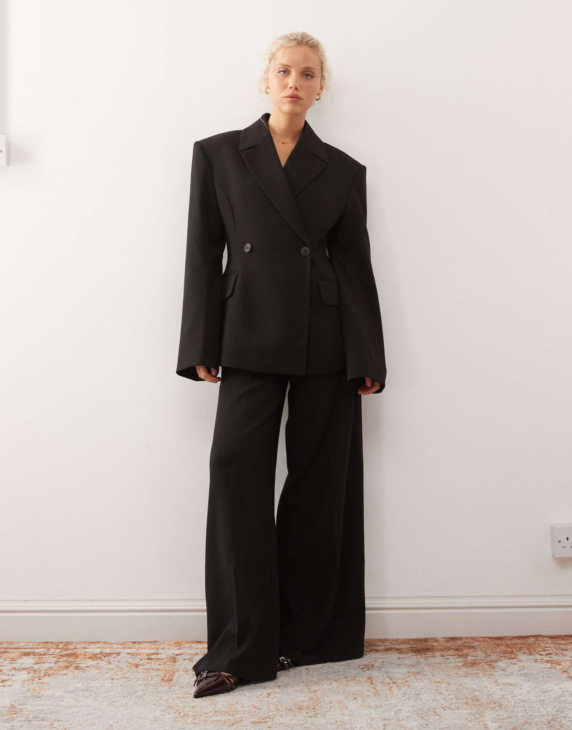 weekday premium flared tailored pants with front pleats in black - part of a set