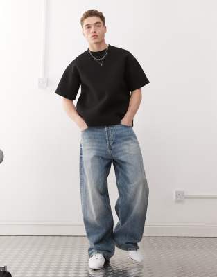 Weekday Simon scuba jersey shorts in black
