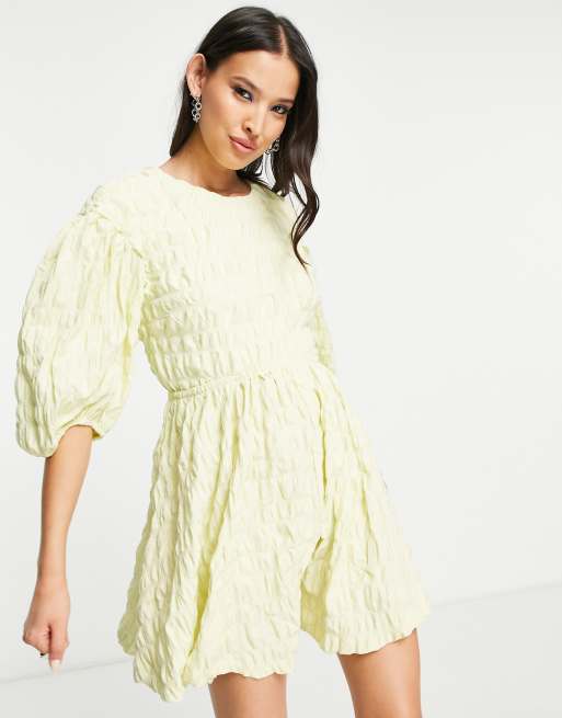 Weekday puff sleeve tie back mini dress in pale green