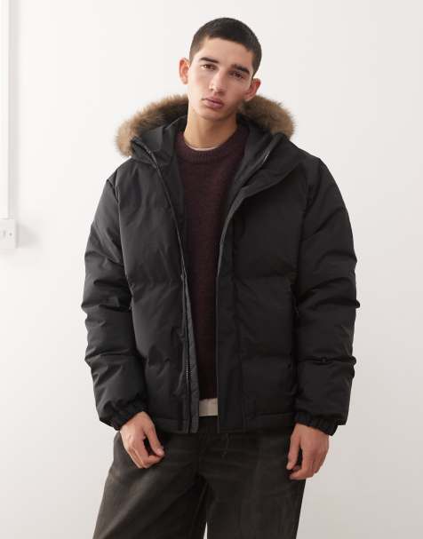 Weekday puffer coat with faux fur lined hood in black - view 1