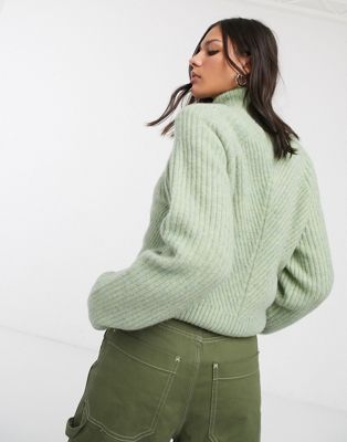 light green sweater
