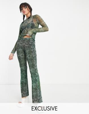 green snake print pants