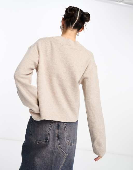 Beige wool jumper shop
