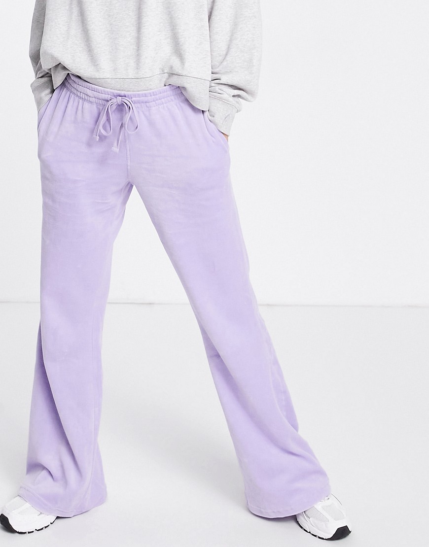Weekday Roxanna organic cotton velour wide leg joggers in purple