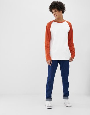orange and white raglan shirt