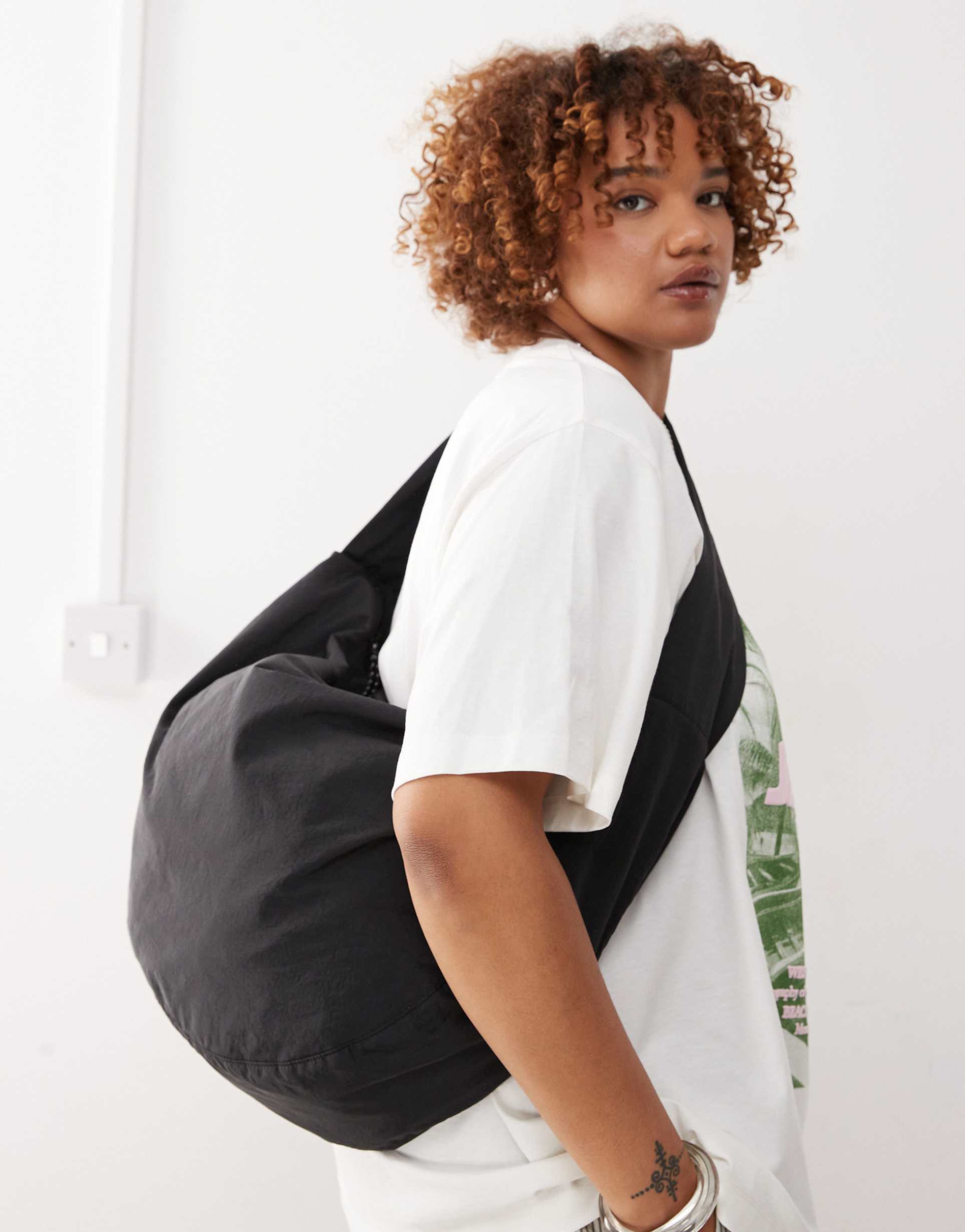 weekday samir crossbody bag in black