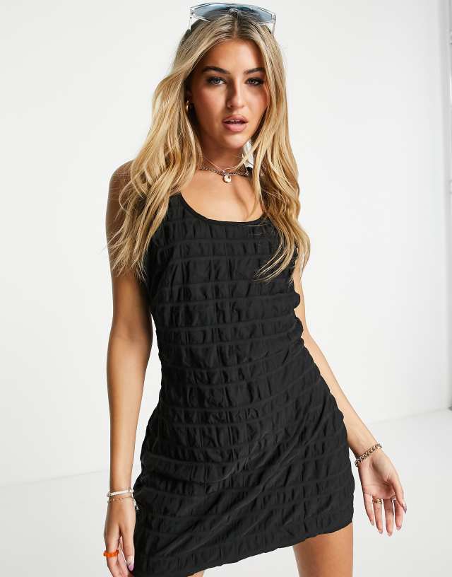 Weekday scoop neck racer back mini dress in black