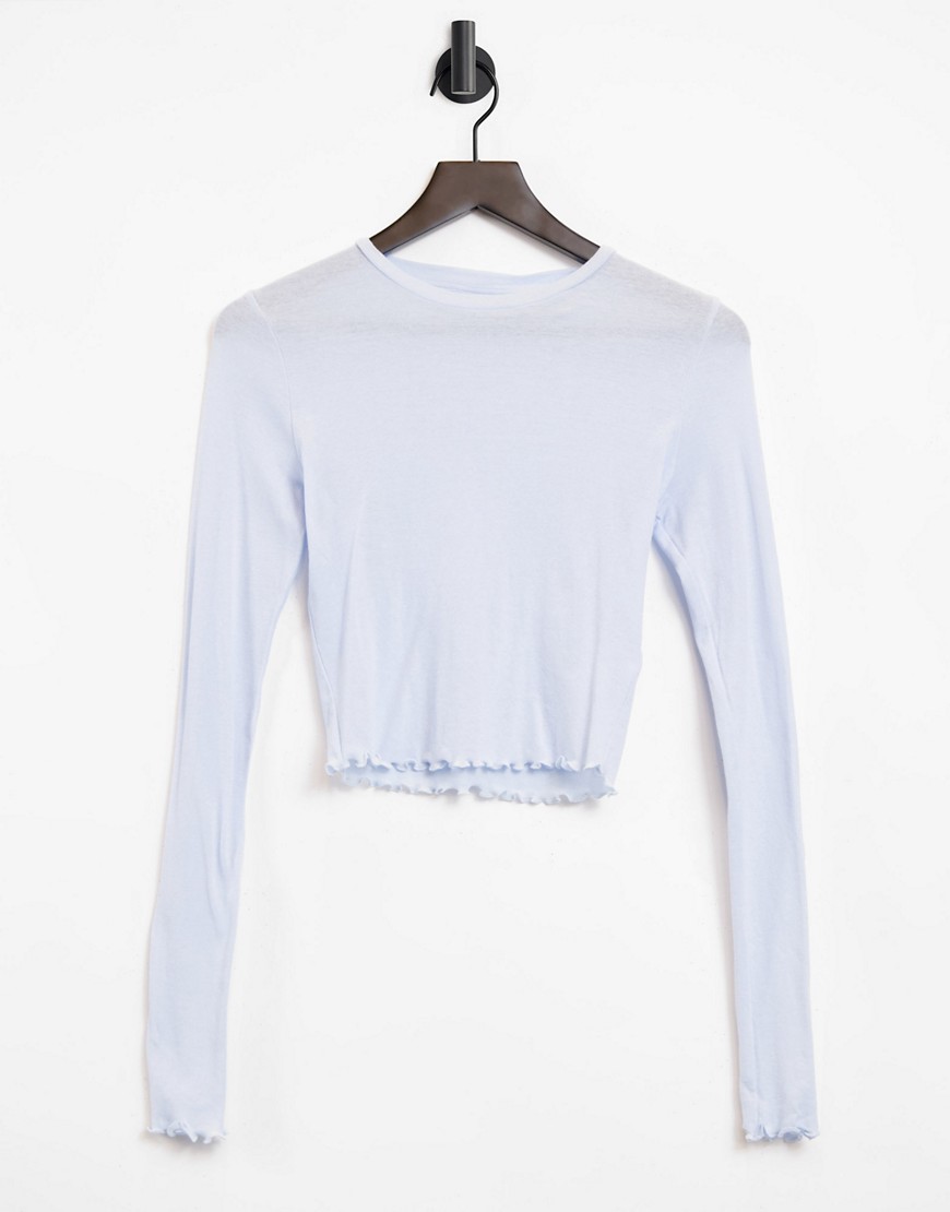 Weekday Sena long sleeve top with lettuce edge in light blue