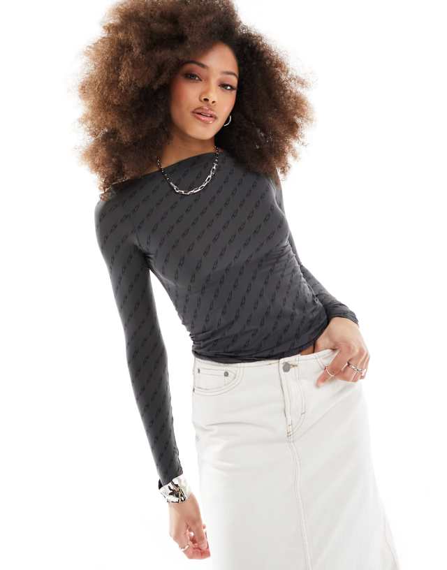 Weekday - sheer long sleeve boatneck top with italic print in black