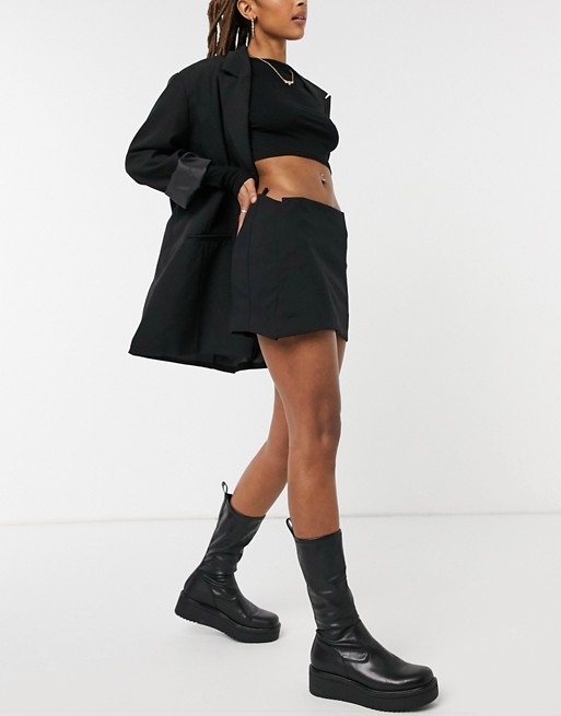 Weekday Sia wrap mini skirt in black