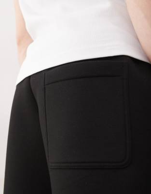 Weekday Simon scuba jersey shorts in black