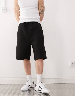 Weekday Simon scuba jersey shorts in black