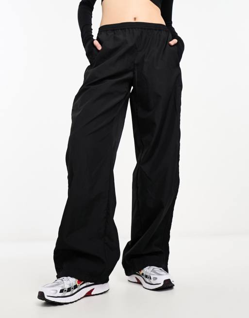 Weekday Simona relaxed track joggers in black | ASOS