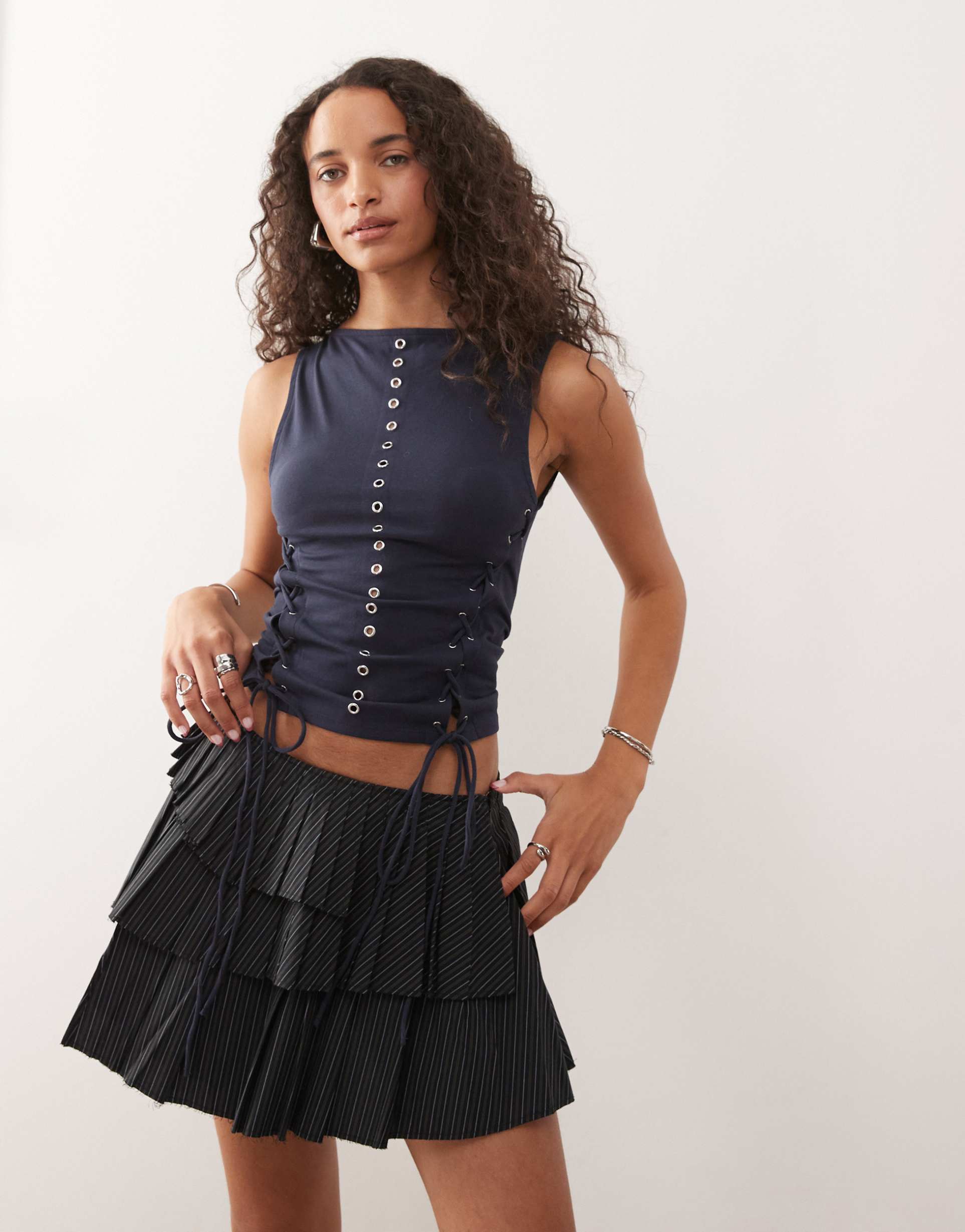 weekday sleeveless grommets top with tie up sides in dark navy