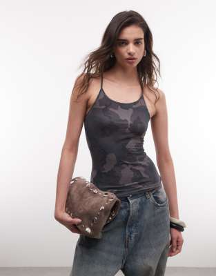 Weekday slim fit racer back tank top in camo print exclusive to ASOS
