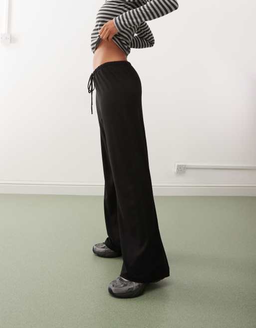 Weekday slouchy trousers in black ASOS