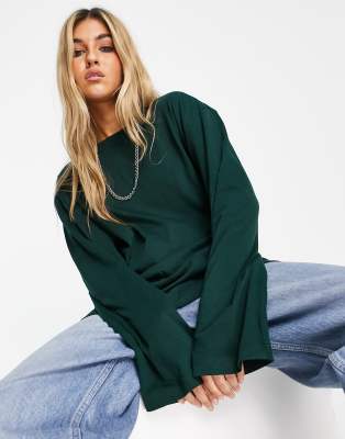 Weekday – Smash – Langärmliges Oversize-Shirt aus Baumwolle in Dunkelgrün – DGREEN