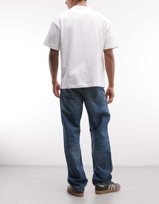Weekday – Space – Gerade geschnittene Relaxed-Fit-Jeans in mittelblauer Used-Waschung mit Dynamo-Details, 3 von 5