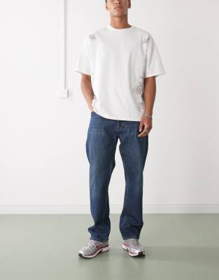 Weekday Space relaxed fit straight leg jeans with split hem detail in dark blue - view 1