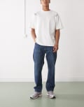 [Weekday] Weekday Space relaxed fit straight leg jeans with split hem detail in dark blue W27 L30 Morning blue