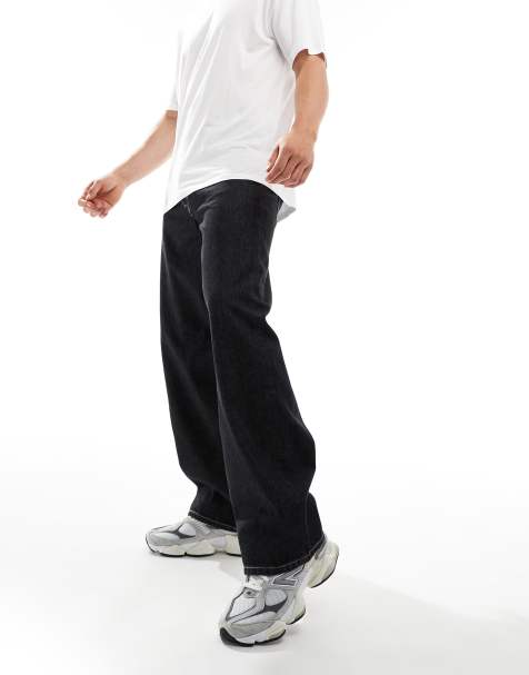 Weekday – Sphere – Locker geschnittene Jeans in schwarzer Acid-Waschung mit niedrigem Bund - view 1