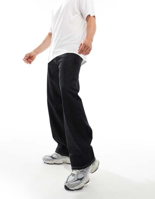 Weekday - Sphere - Losvallende jeans met lage taille in zwart met acid wash
