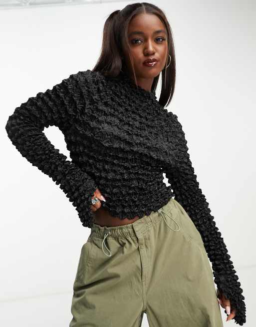 Weekday - Spike - Getextureerde mesh top met lange mouwen in zwart
