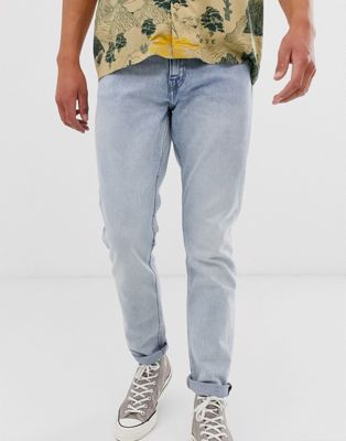 Weekday - Sunday - Ruimvallende jeans met smaltoelopende pijpen in blauw