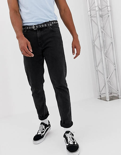 Weekday Sunday - Ruimvallende jeans met smaltoelopende pijpen in zwarte wassing