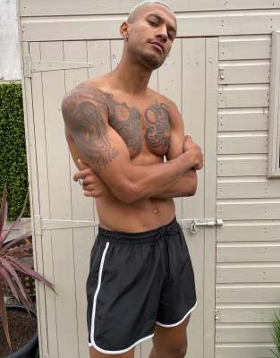 tan swim shorts