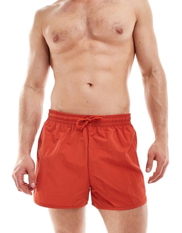 Weekday - tan runner swim shorts in red