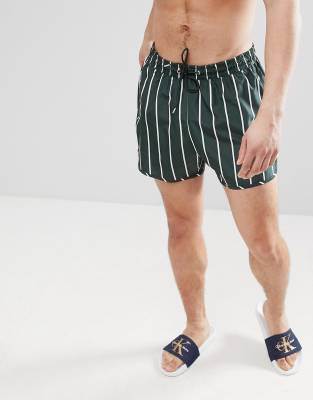 tan swim shorts