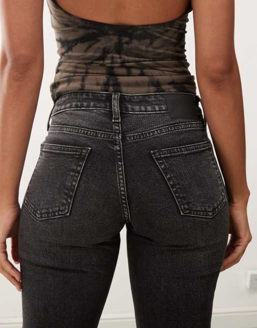 Weekday - Tension - Slim-fit bootcut jeans in zwart met streperige wassing, 4 van 5