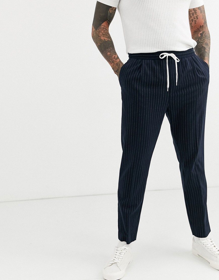 Weekday Thriller joggers with pinstripe in navy
