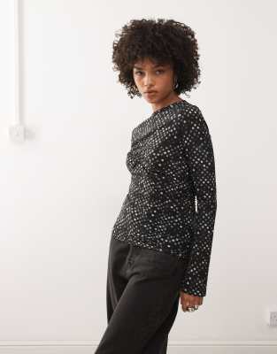 Weekday - Transparentes Netzoberteil in Schwarz mit Polka Dots und gerafftem Detail