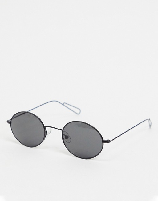 Weekday Trip oval sunglasses in black